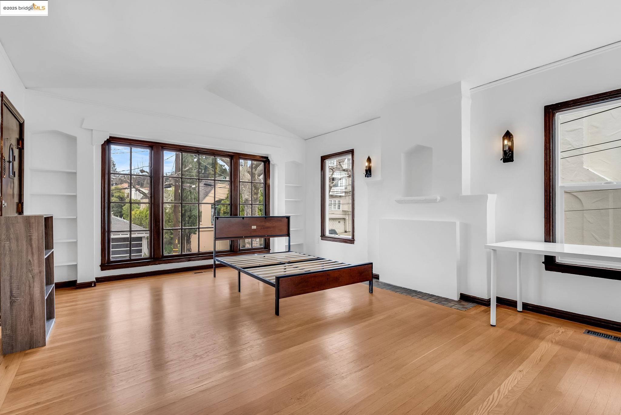 2340 Virginia Street Berkeley, CA 94709 - Photo 25 of 56 a living room with furniture window and wooden floor