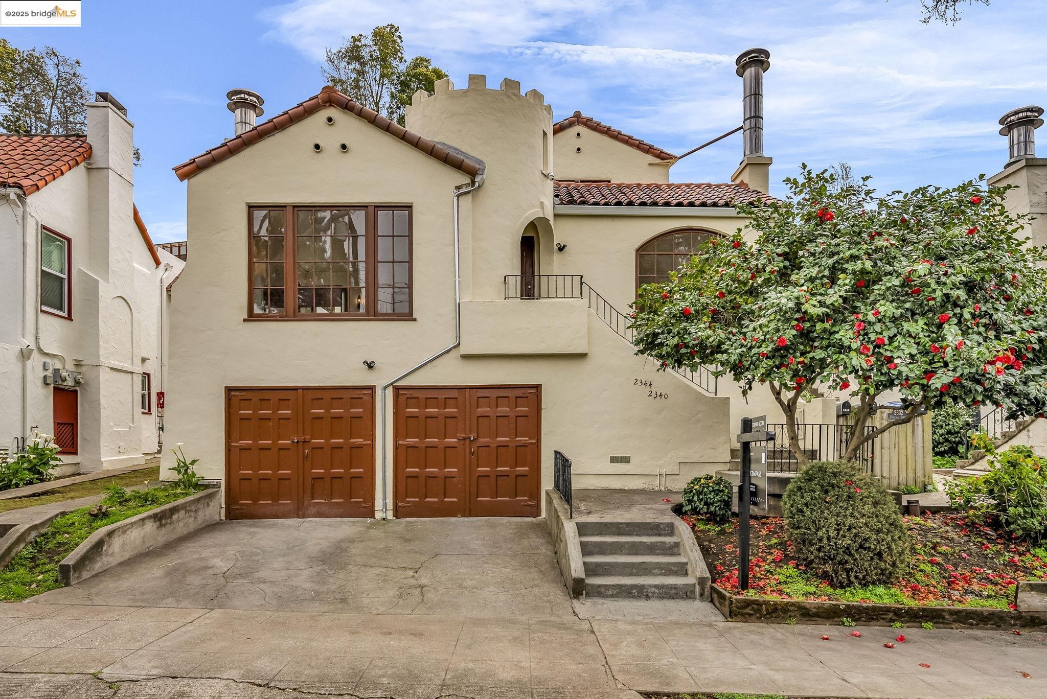 2340 Virginia Street Berkeley, CA 94709 - Photo 3 of 56 a front view of a house with a garage