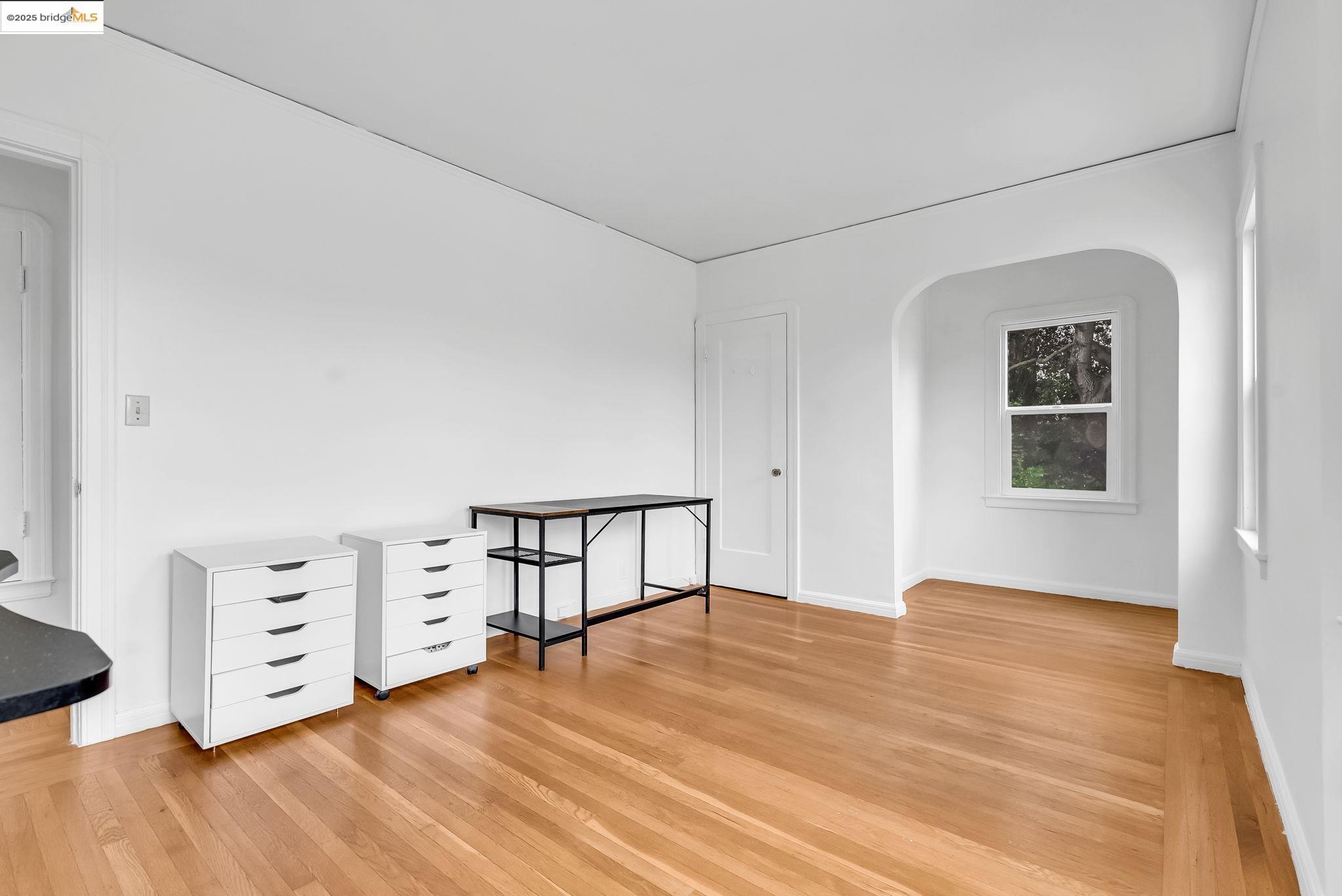 2340 Virginia Street Berkeley, CA 94709 - Photo 36 of 56 a view of an empty room with wooden floor