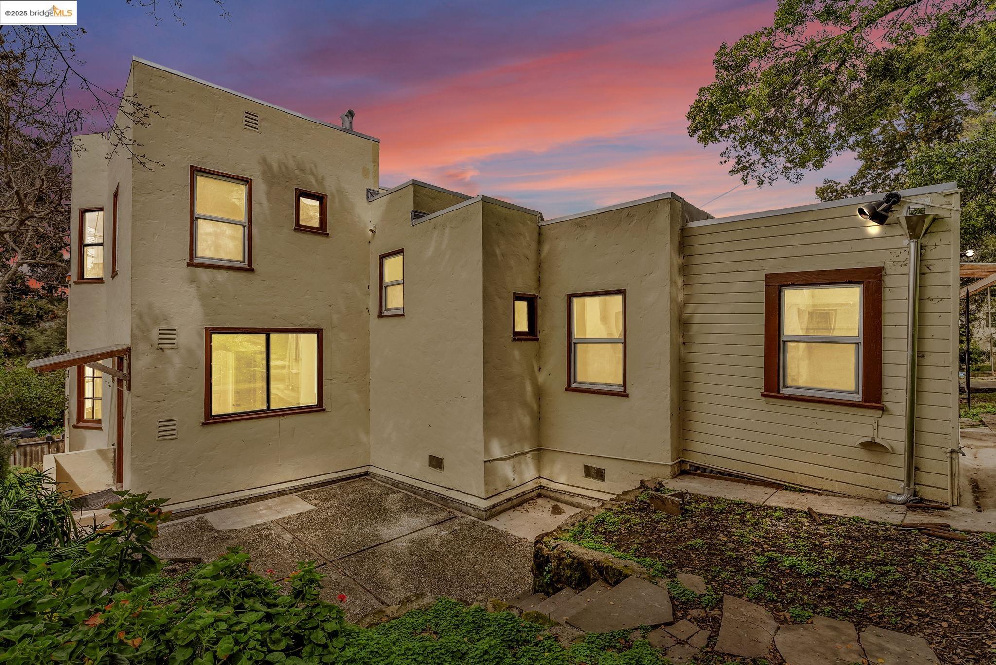 2340 Virginia Street Berkeley, CA 94709 - Photo 48 of 56 a front view of a house with a yard