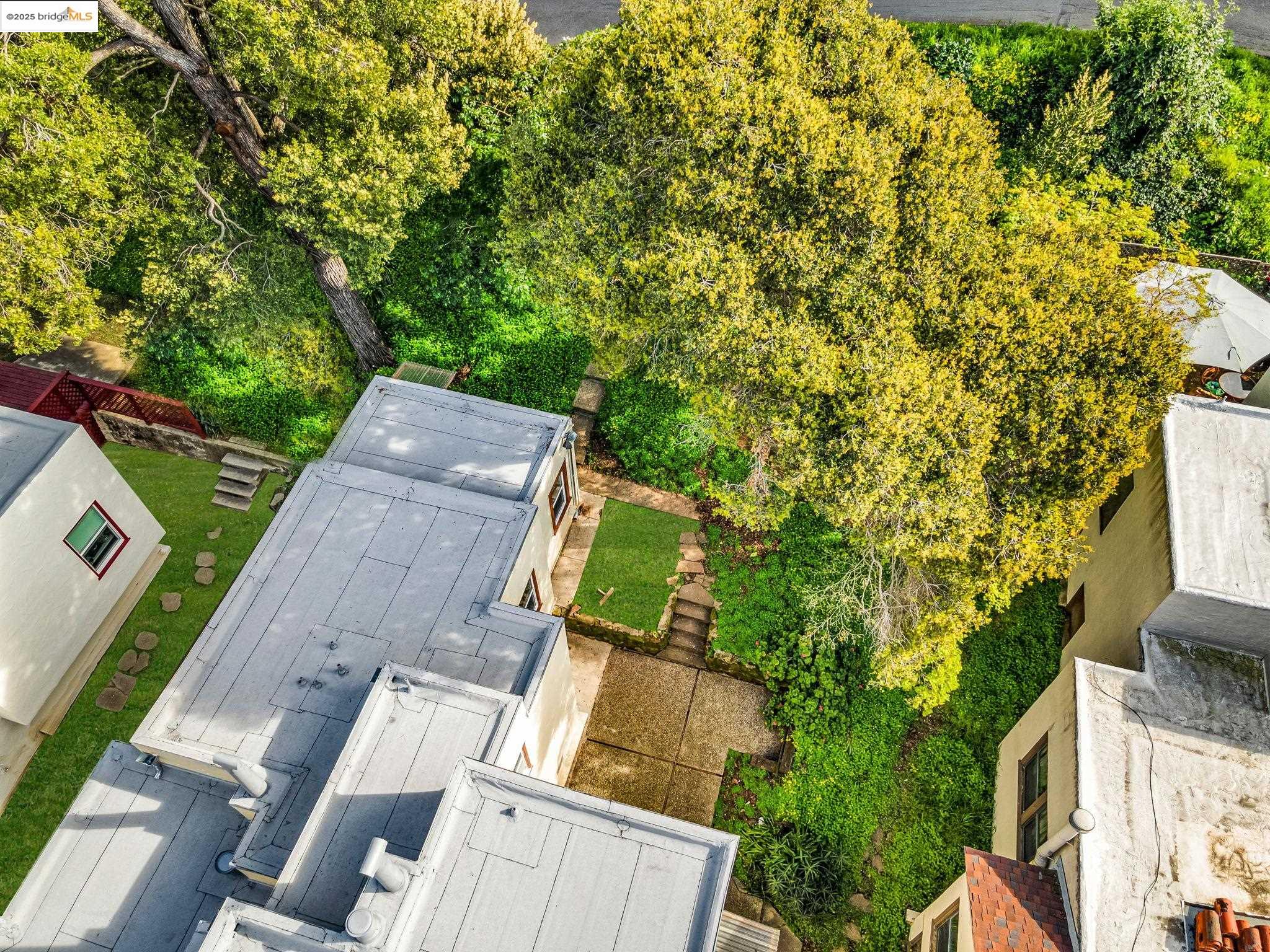 2340 Virginia Street Berkeley, CA 94709 - Photo 54 of 56 an aerial view of a house with garden space and street view