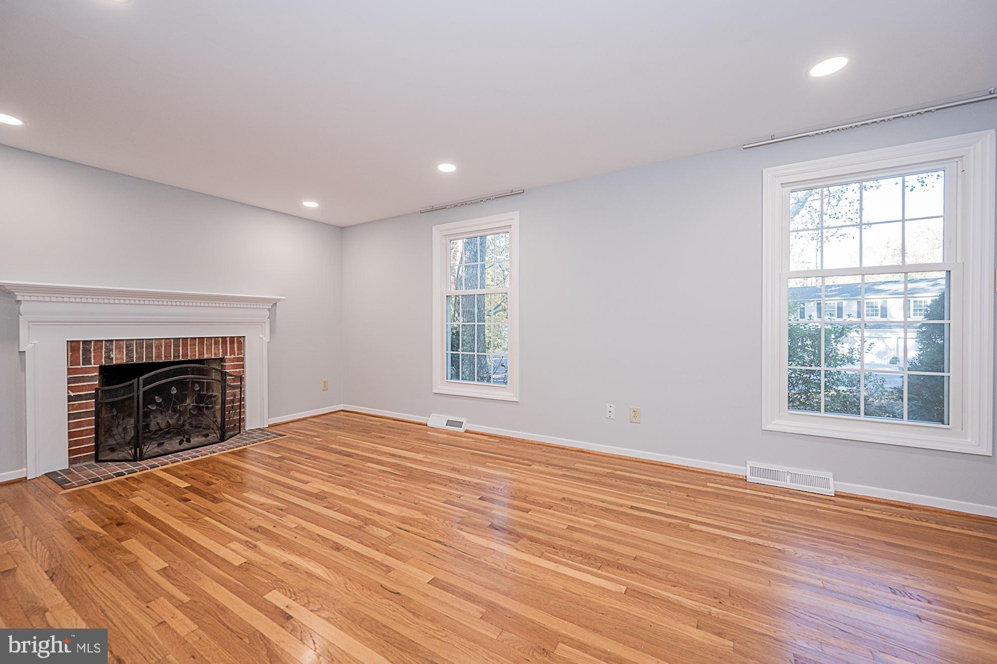 5125 Rondel Place Columbia, MD 21044 - Photo 2 of 35 Living Room | Hardwood Floors | Fireplace