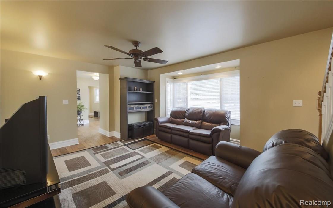 6922 Nollar Road Whitmore Lake, MI 48189 - Photo 5 of 25 HARDWOOD FLOORS IN LIVING ROOM