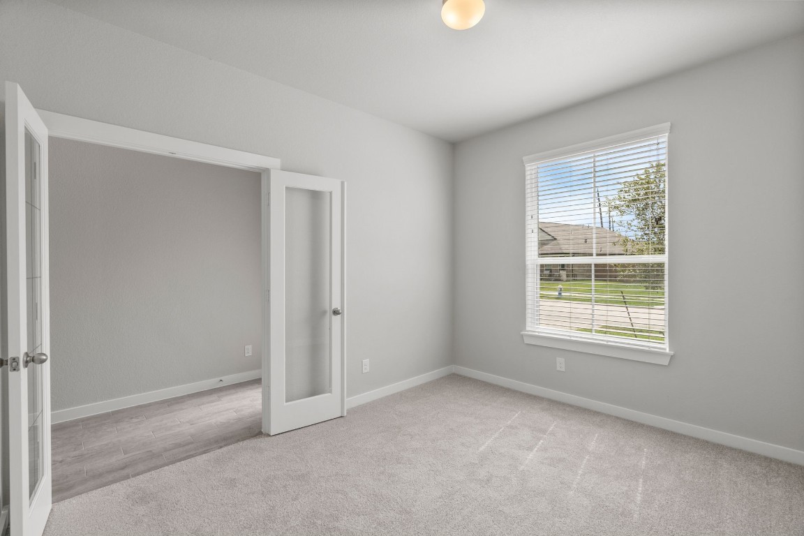 15711 Telge Ridge Lane Cypress, TX 77429 - Photo 3 of 20 an empty room with a window