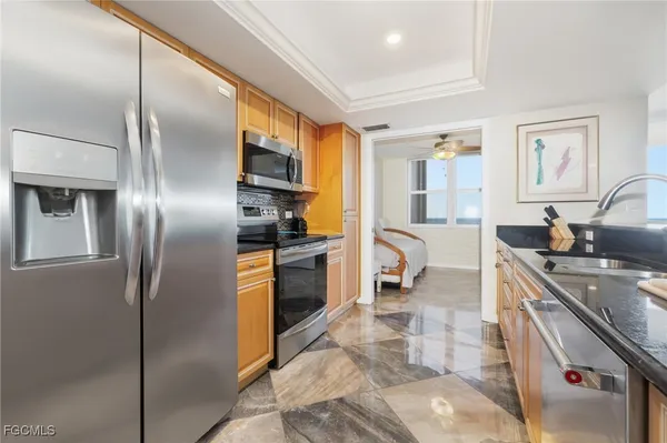 a kitchen with a stove and a microwave