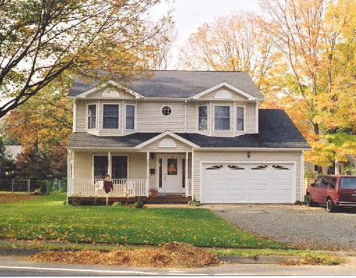 1 Huntington Road Stratford, CT 06614 - Photo 1 of 1 front view of a house with a yard