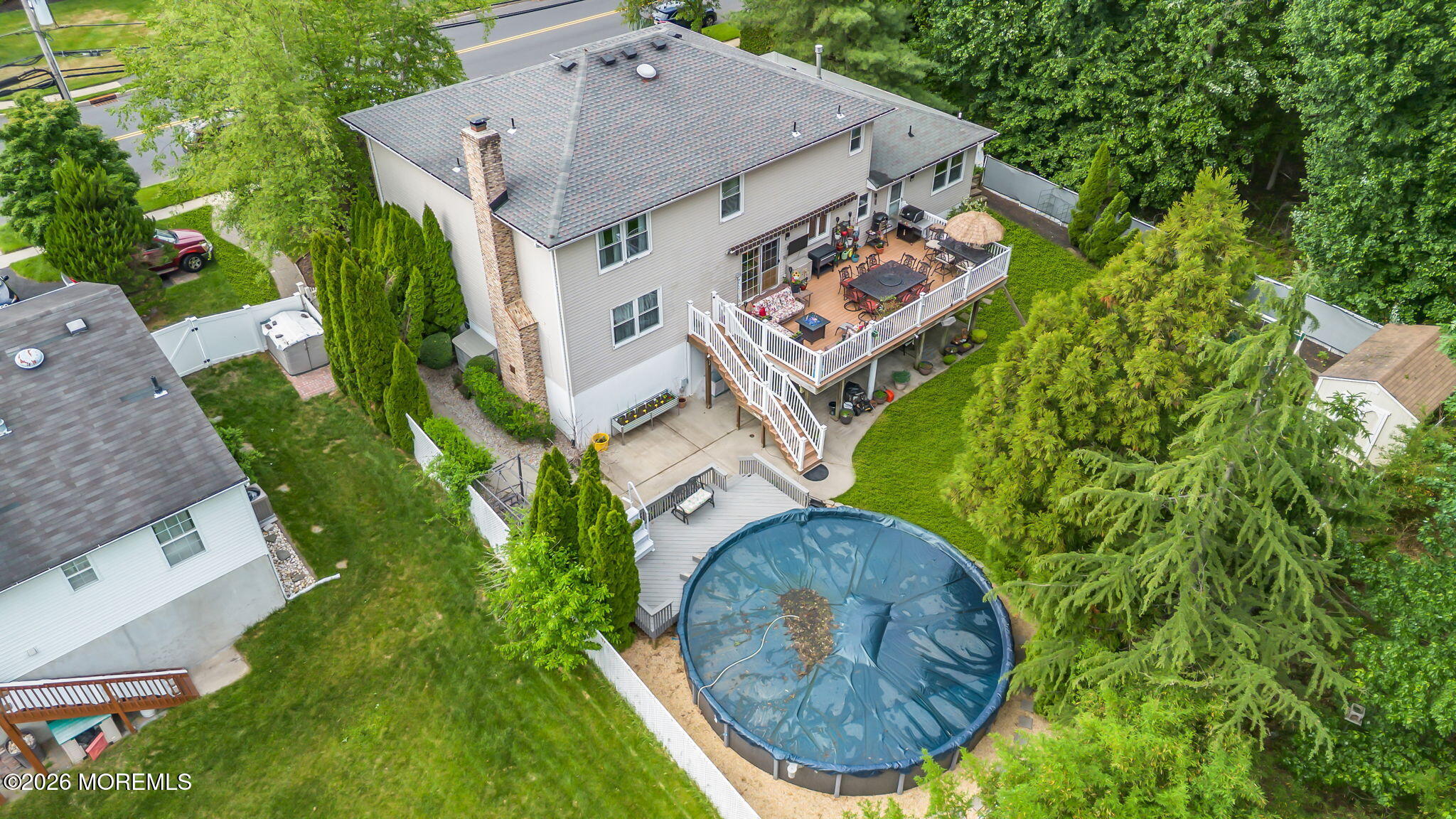 21 Ryan Road Marlboro, NJ 07746 - Photo 47 of 56 an aerial view of a house with garden space and swimming pool