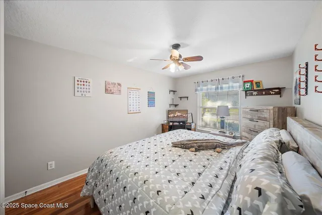 a bathroom with a sink a toilet and a window