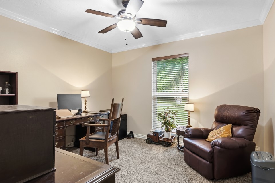 9211 Benwick Street Spring, TX 77379 - Photo 20 of 27 a living room with furniture and a window