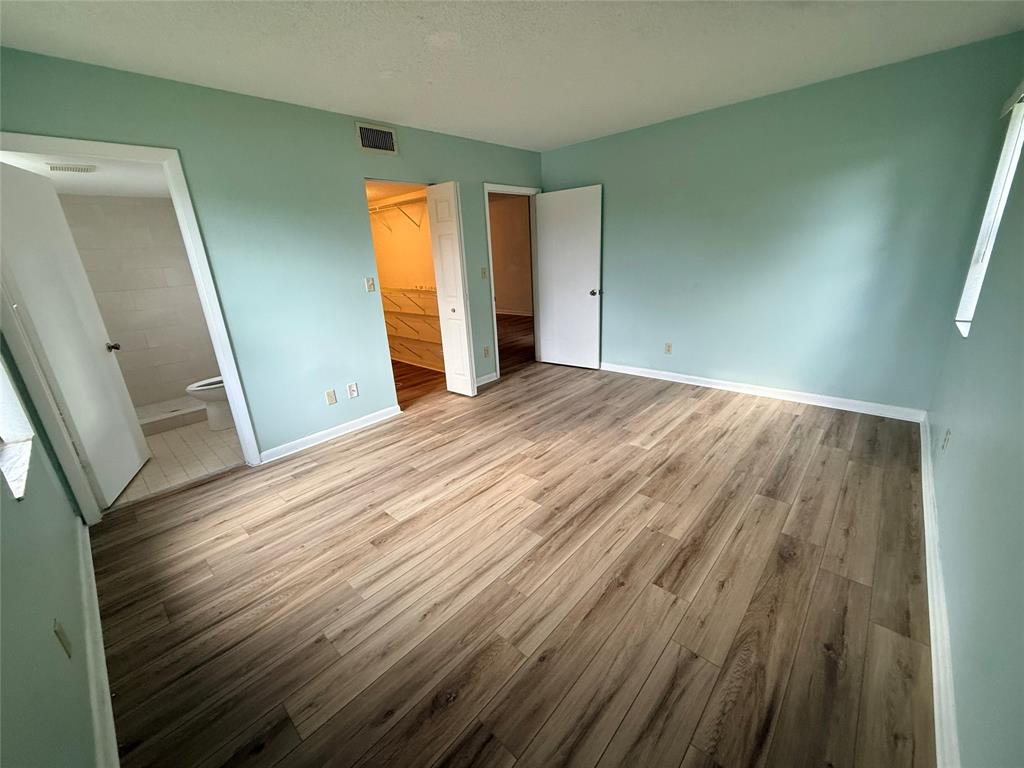 7406 Woodmont Terrace, Unit 106 Tamarac, FL 33321 - Photo 8 of 20 Master bedroom