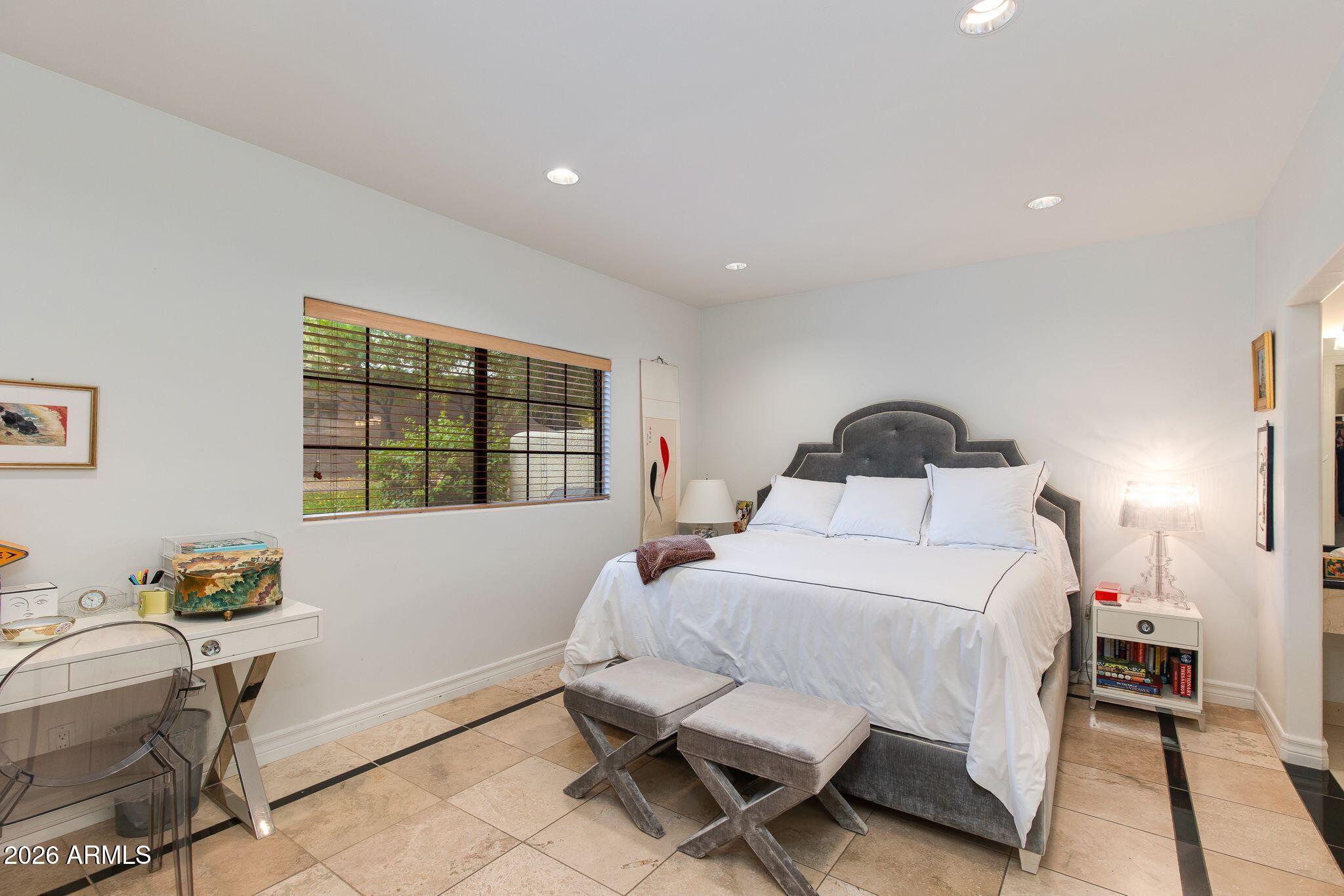 6227 North 30th Way Phoenix, AZ 85016 - Photo 5 of 16 a bedroom with a bed and a window