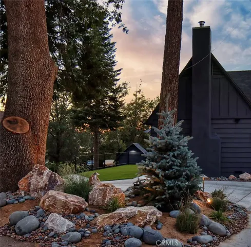 a backyard of a house with lots of green space