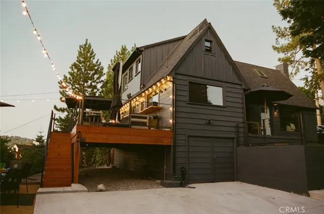 a front view of a house with a garage