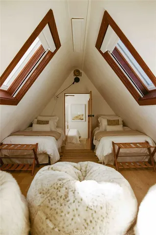 a bathroom with a sink mirror and window