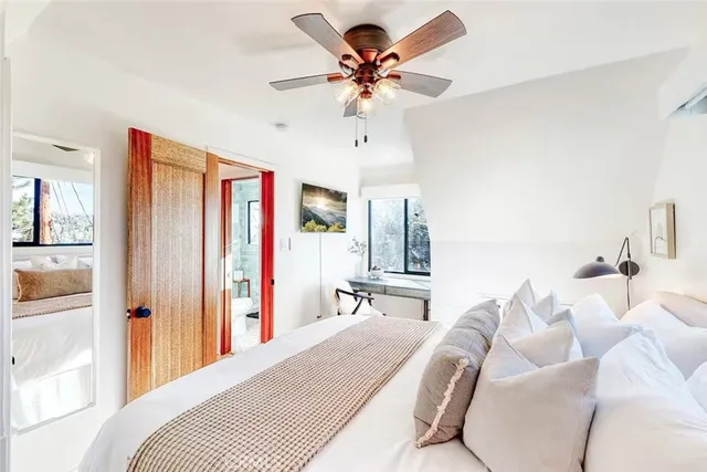 a view of an house with backyard porch and furniture