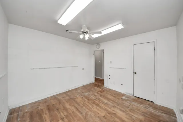 a view of a room with a large window