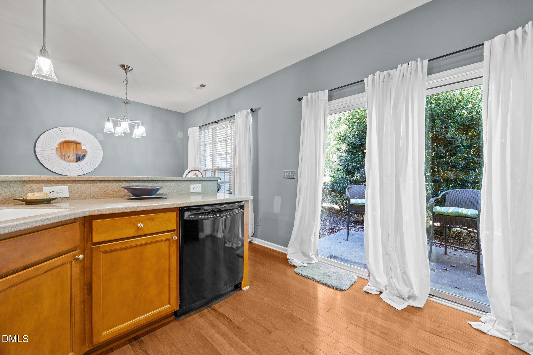 7022 Racine Way Raleigh, NC 27690 - Photo 12 of 26 a spacious bathroom with a sink double vanity and a mirror