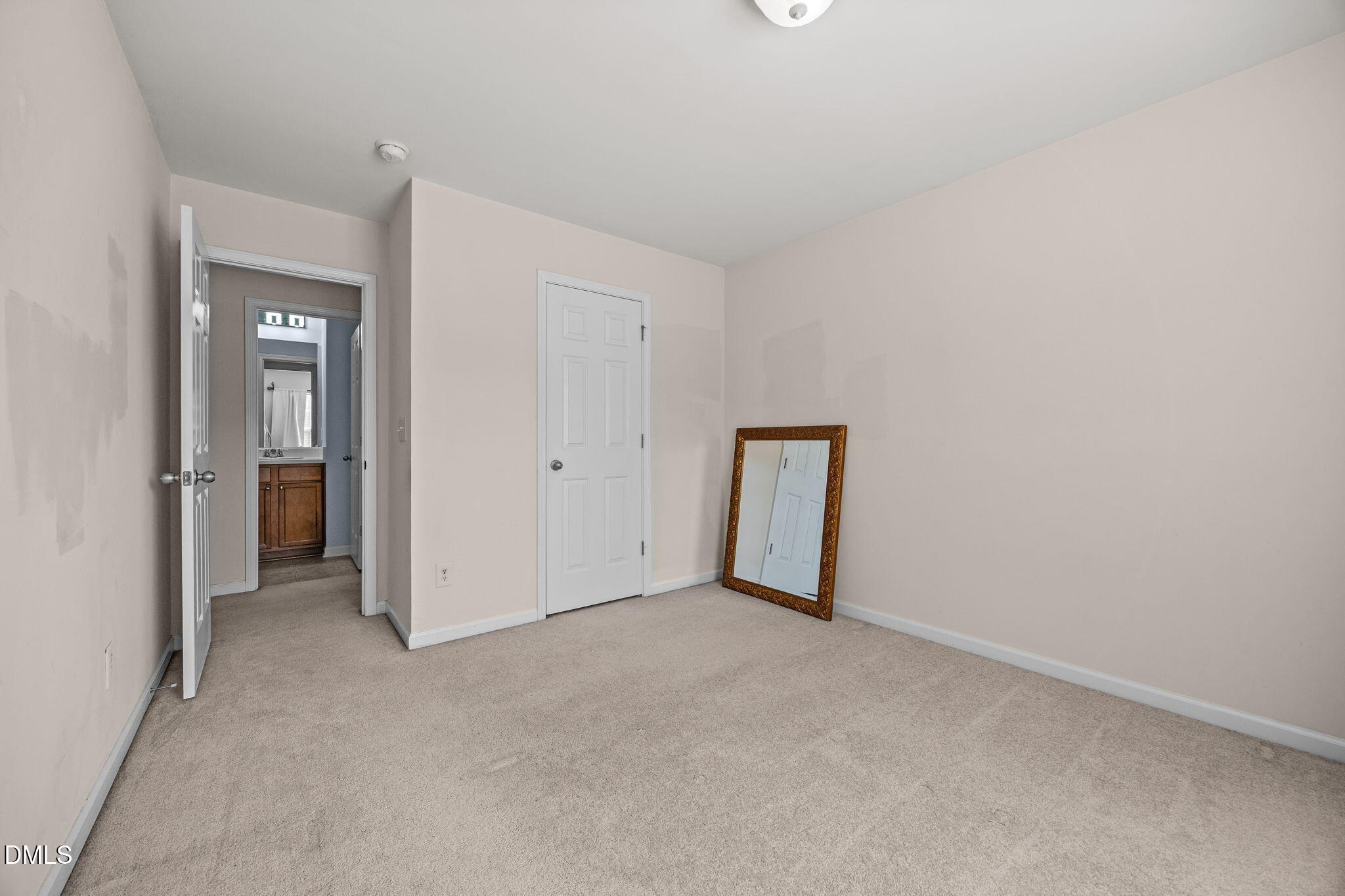 7022 Racine Way Raleigh, NC 27690 - Photo 21 of 26 a view of an empty room and closet area