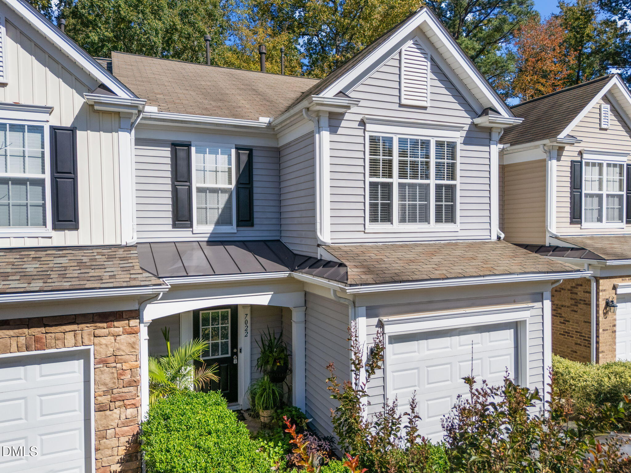 7022 Racine Way Raleigh, NC 27690 - Photo 3 of 26 a front view of a house with a yard