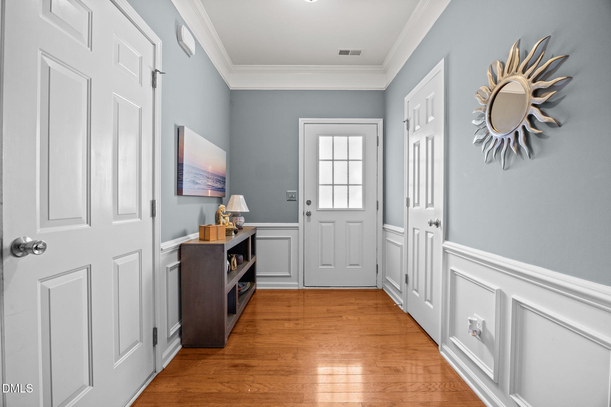 7022 Racine Way Raleigh, NC 27690 - Photo 4 of 26 a view of a kitchen from the hallway