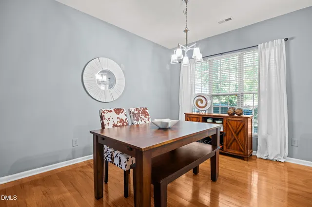 a view of a dining room with furniture