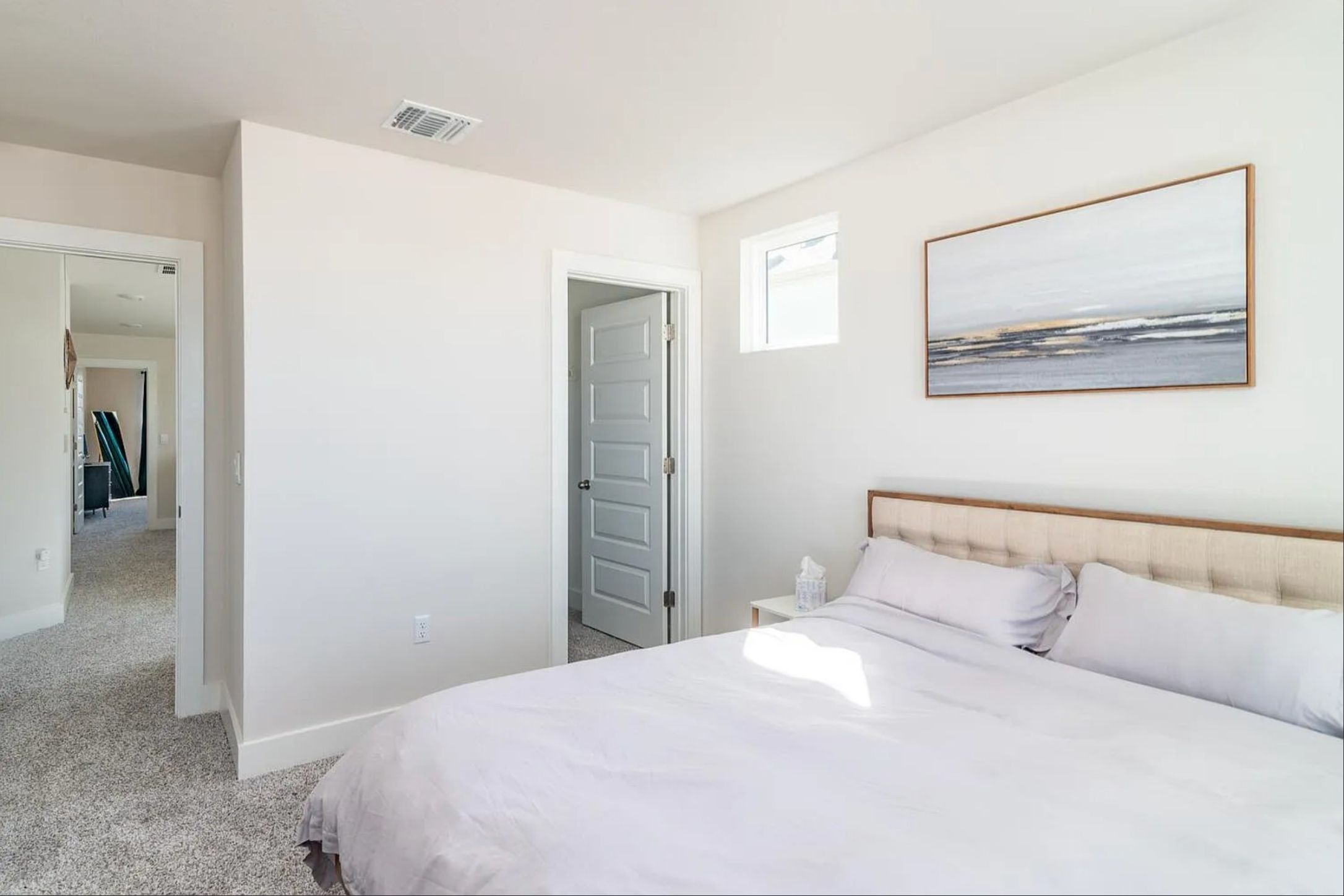 7501 Travertine Spring Drive Austin, TX 78744 - Photo 21 of 28 Bedroom with light-colored walls and carpeted flooring