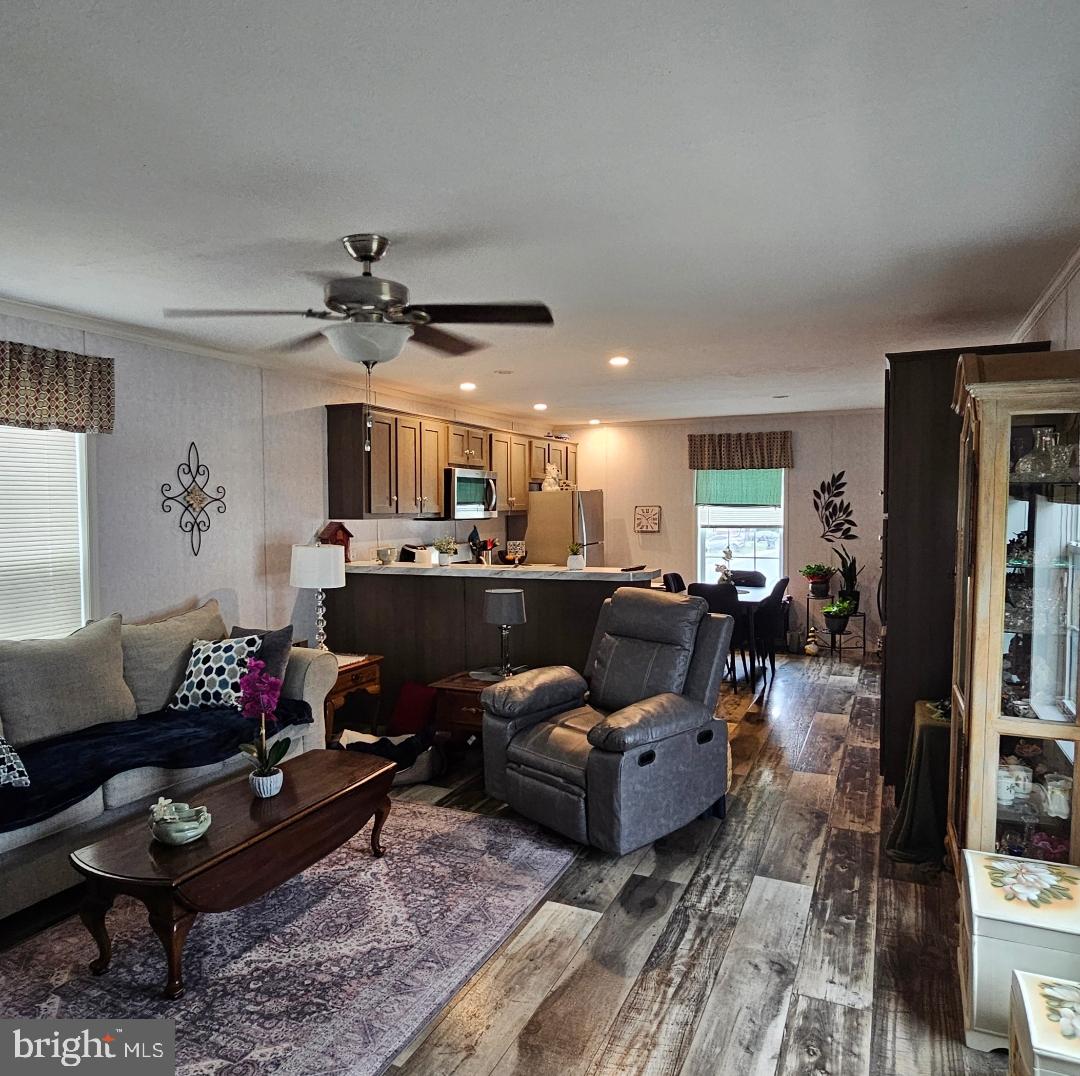 2110 Mays Landing Road, Unit 14 Millville, NJ 08332 - Photo 7 of 12 a living room with furniture kitchen view and a window
