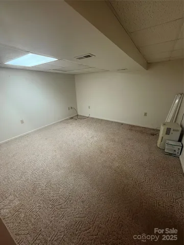 a view of a room with racks on the wall