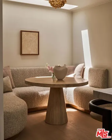 a bedroom with a large bed and a large window