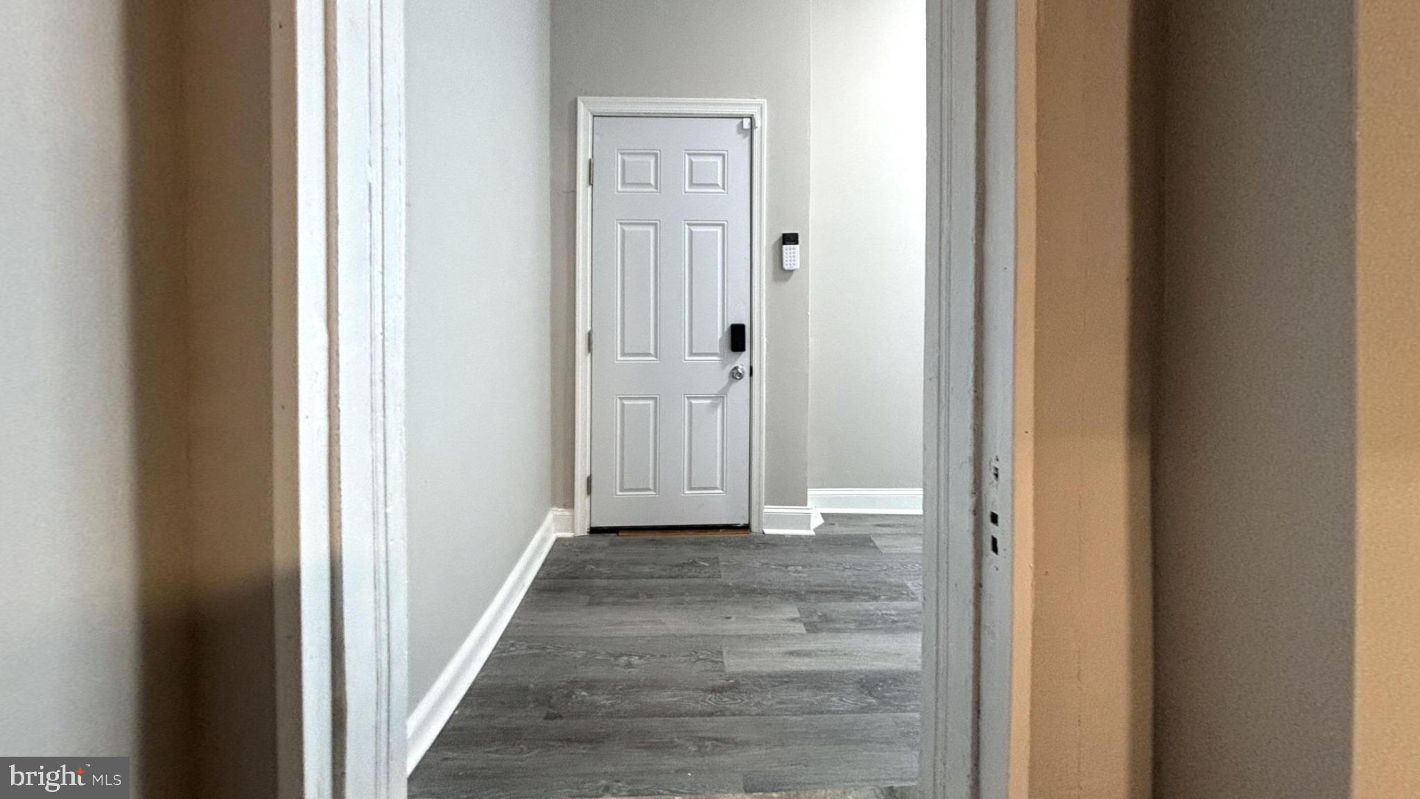 2527 South Felton Street Philadelphia, PA 19142 - Photo 1 of 11 a view of a hallway with wooden floor