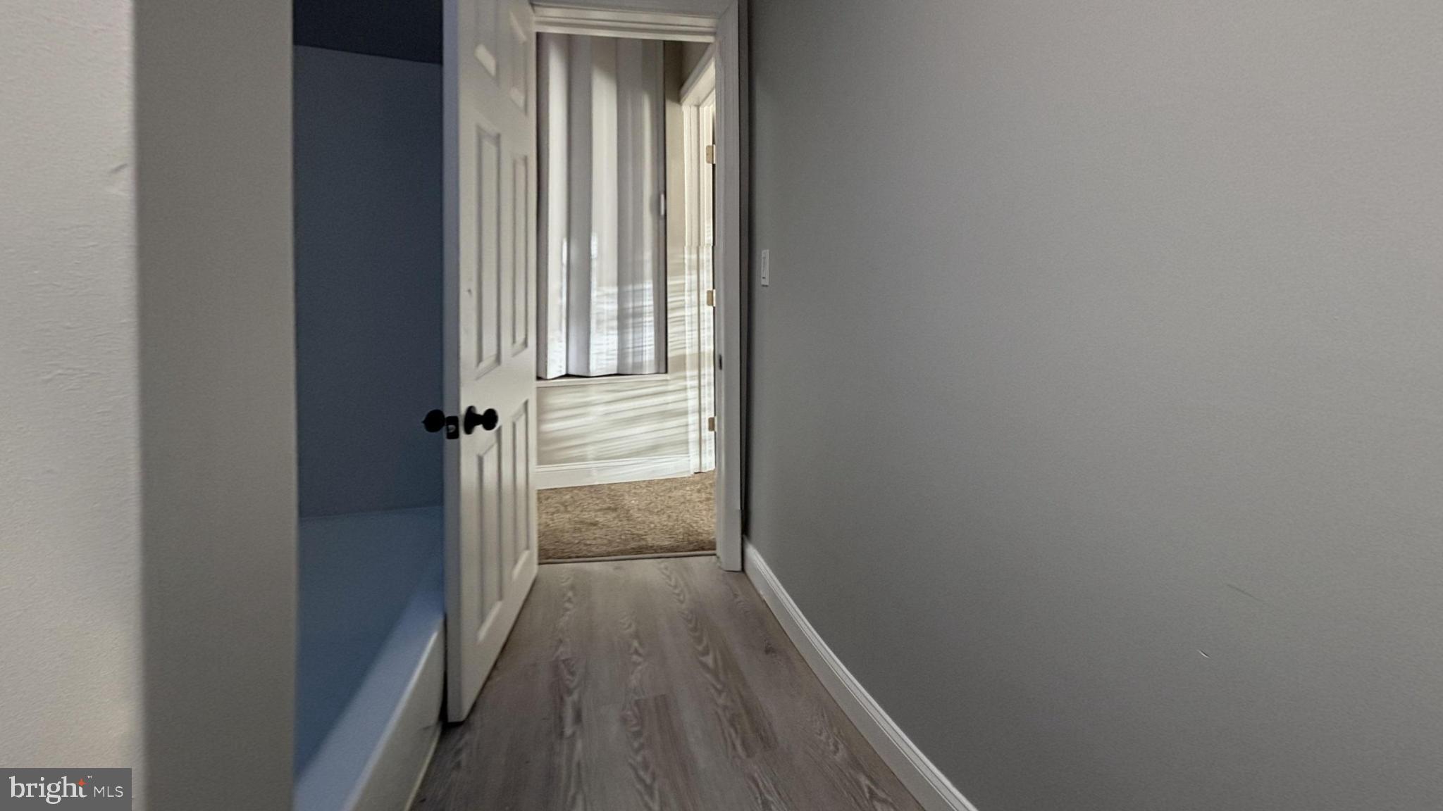 2527 South Felton Street Philadelphia, PA 19142 - Photo 11 of 11 a view of a hallway with wooden floor