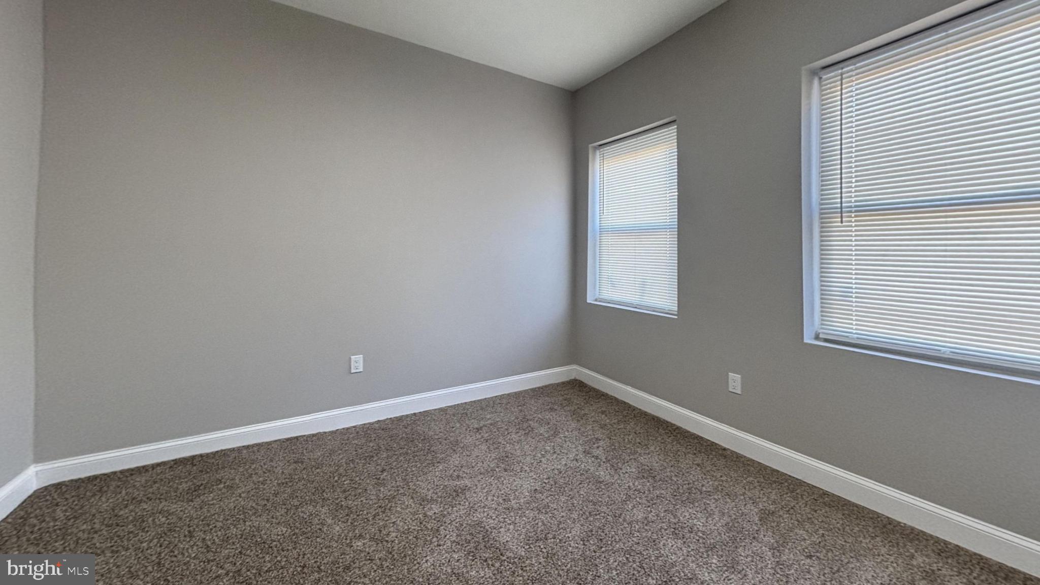 2527 South Felton Street Philadelphia, PA 19142 - Photo 7 of 11 an empty room with a window