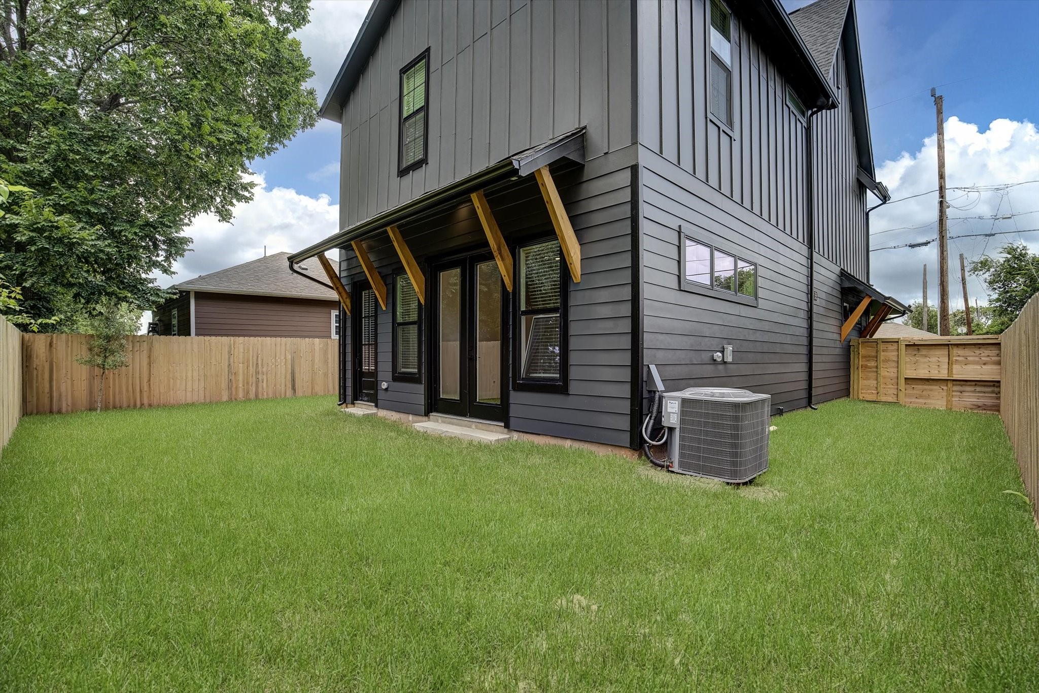 3806 Dreyfus Street Houston, TX 77021 - Photo 38 of 48 Spacious backyard ideal for entertaining or children's play area. The exterior features pre-wired outdoor speakers and convenient exterior power outlets to enhance your outdoor living experience.