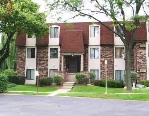 835 Waterview Circle, Unit 4 Vernon Hills, IL 60061 - Photo 1 of 1 a view of a house with a yard and large tree