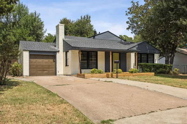 a house with yard in front of it