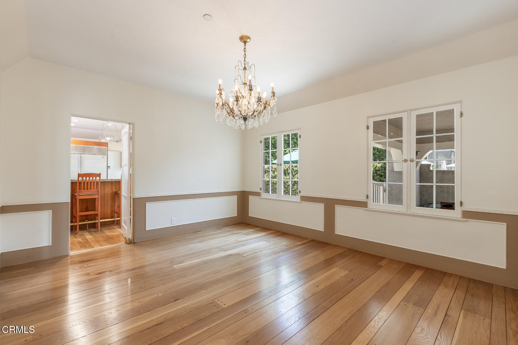 369 West Kenneth Road Glendale, CA 91202 - Photo 19 of 36 wooden floor in an empty room with a window