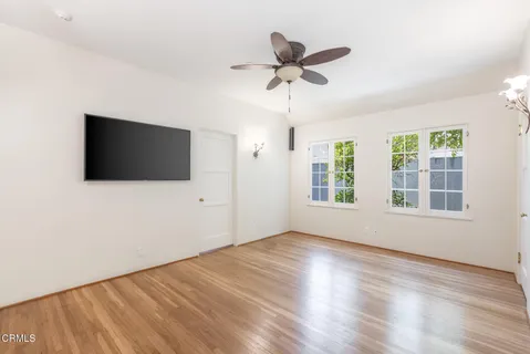 a view of a livingroom with a flat screen tv