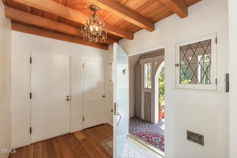 a view of entryway with wooden floor