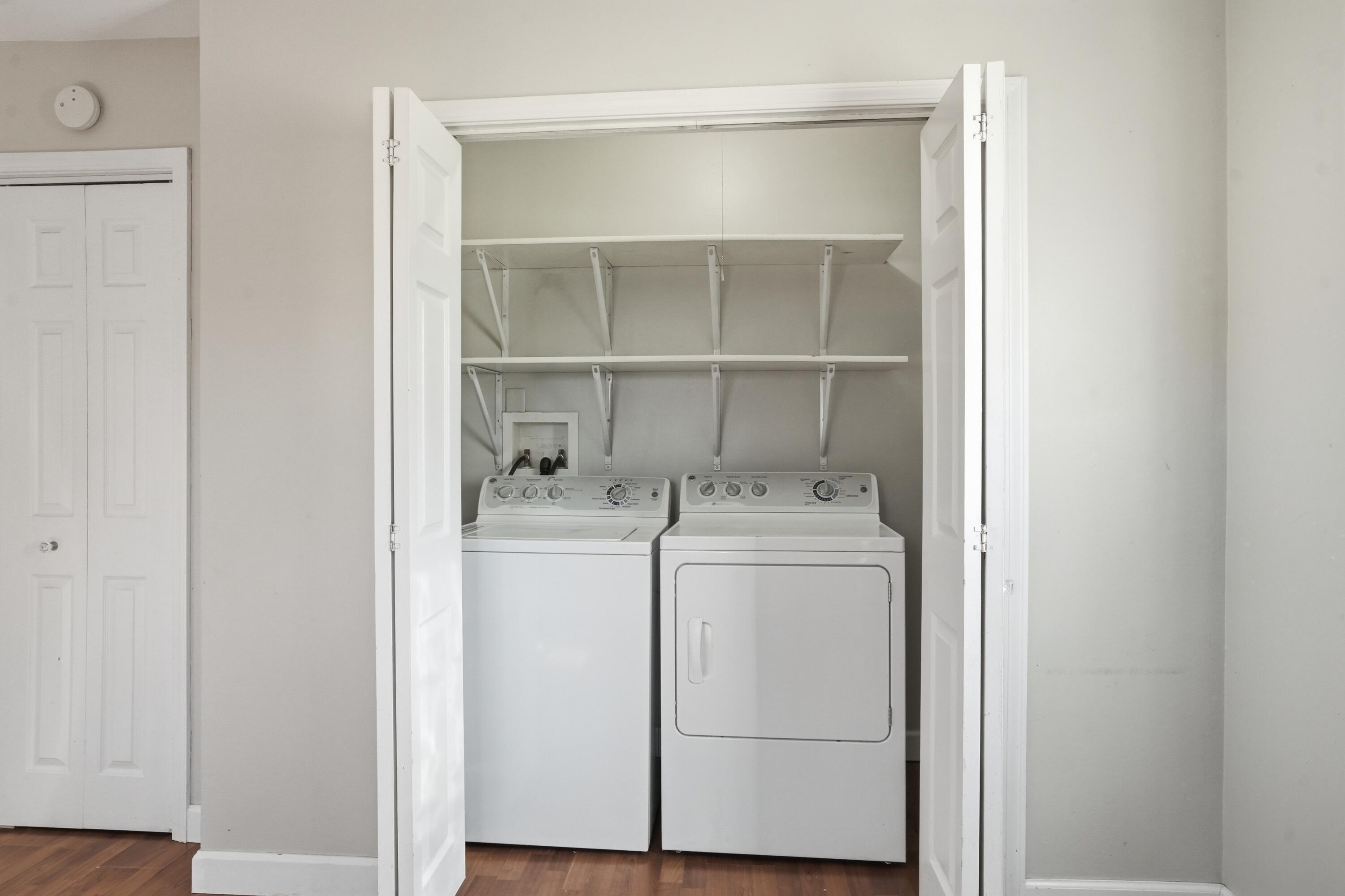 316 Oak Circle Crown Point, IN 46307 - Photo 12 of 19 a utility room with dryer and washer