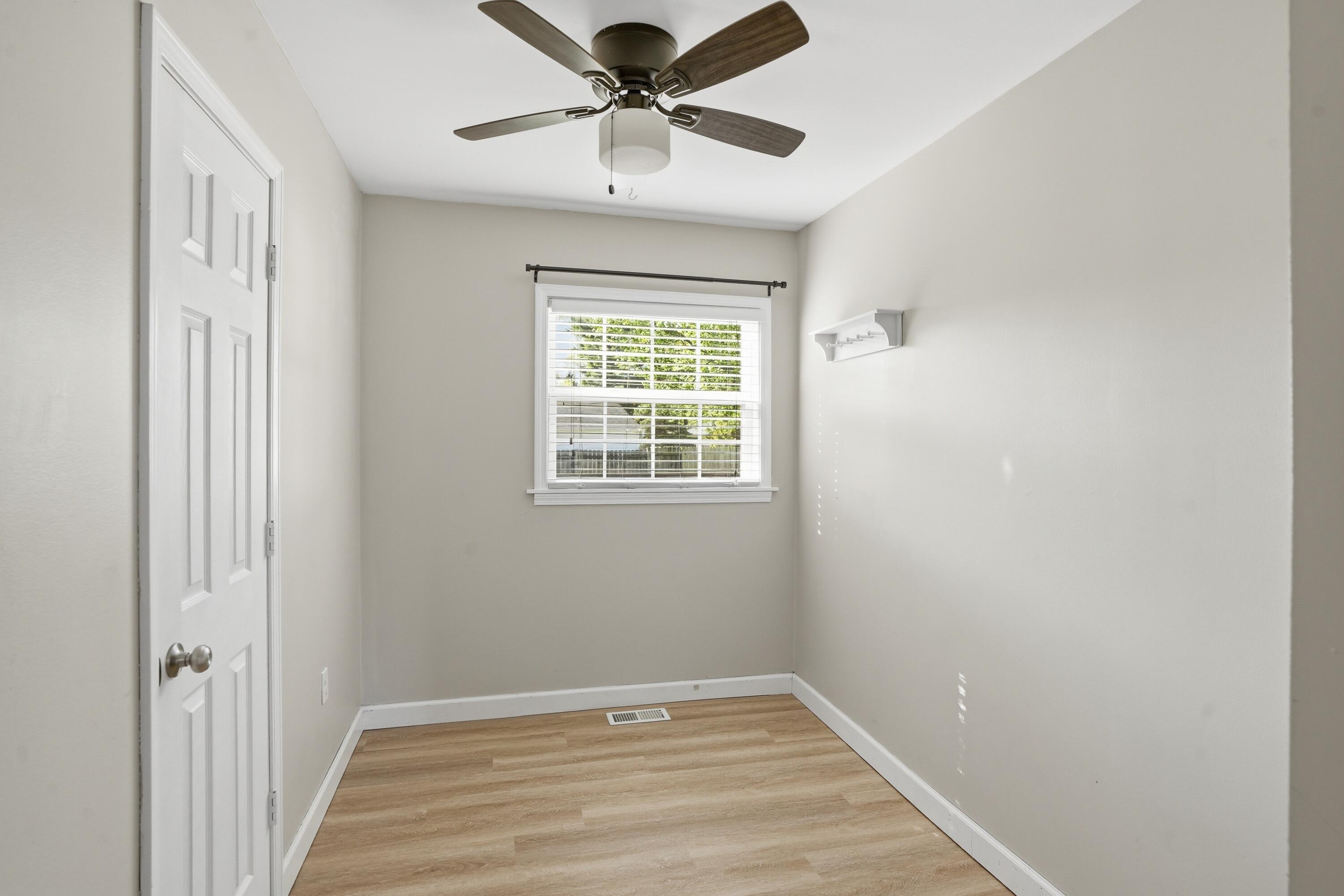 316 Oak Circle Crown Point, IN 46307 - Photo 13 of 19 a view of an empty room with a window