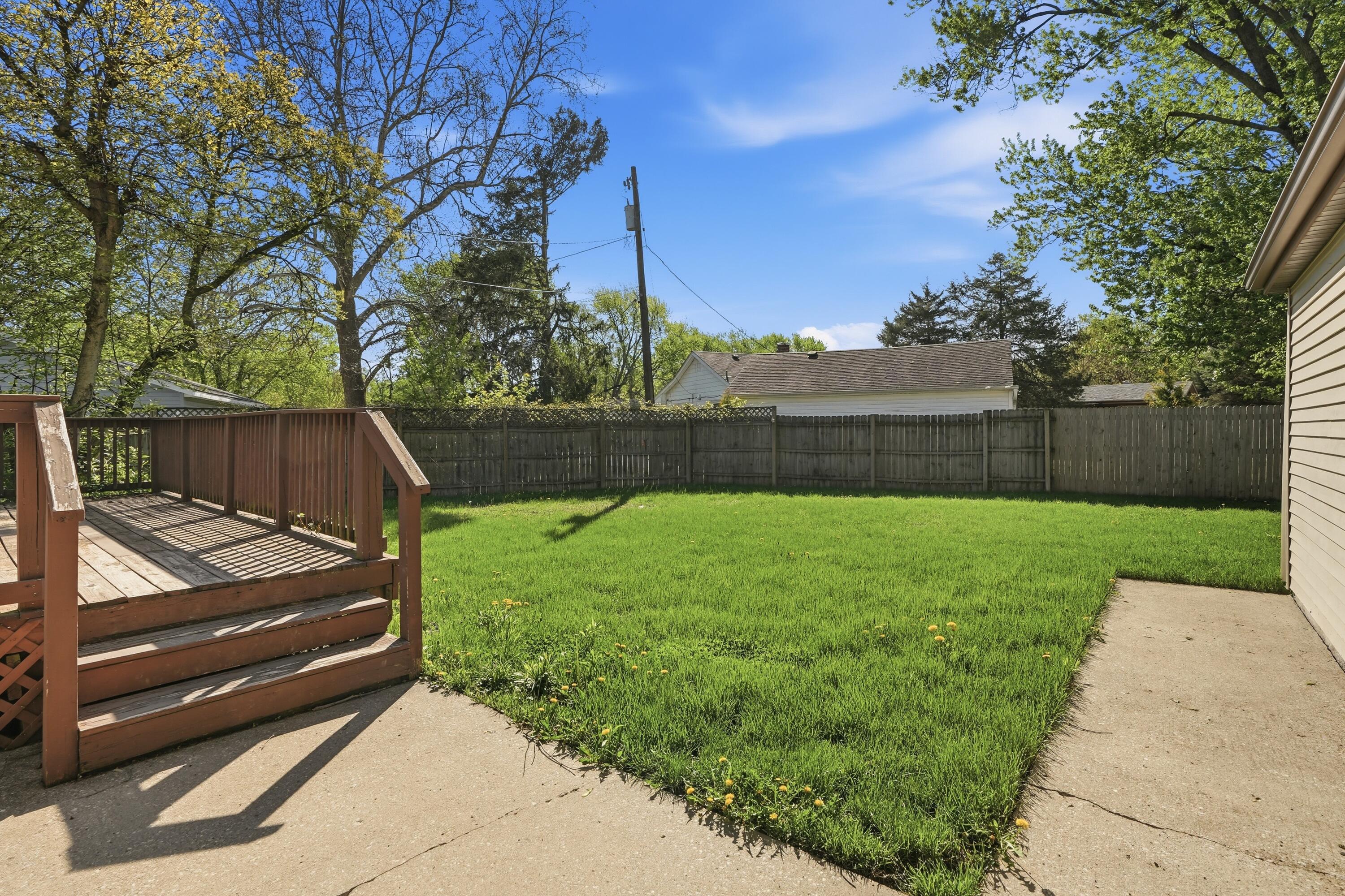 316 Oak Circle Crown Point, IN 46307 - Photo 17 of 19 a view of a backyard with a garden