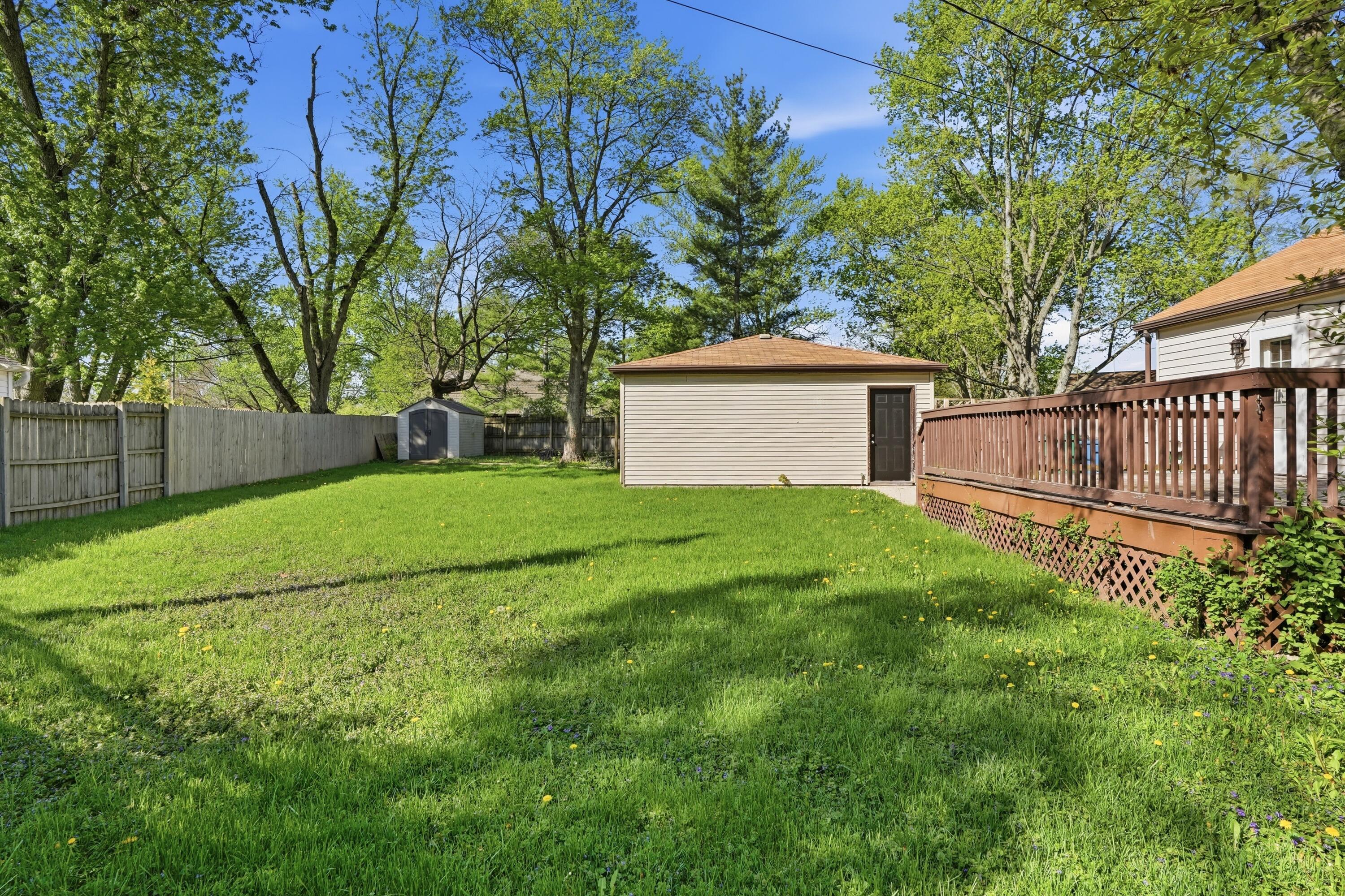 316 Oak Circle Crown Point, IN 46307 - Photo 18 of 19 a view of a house with backyard and tree