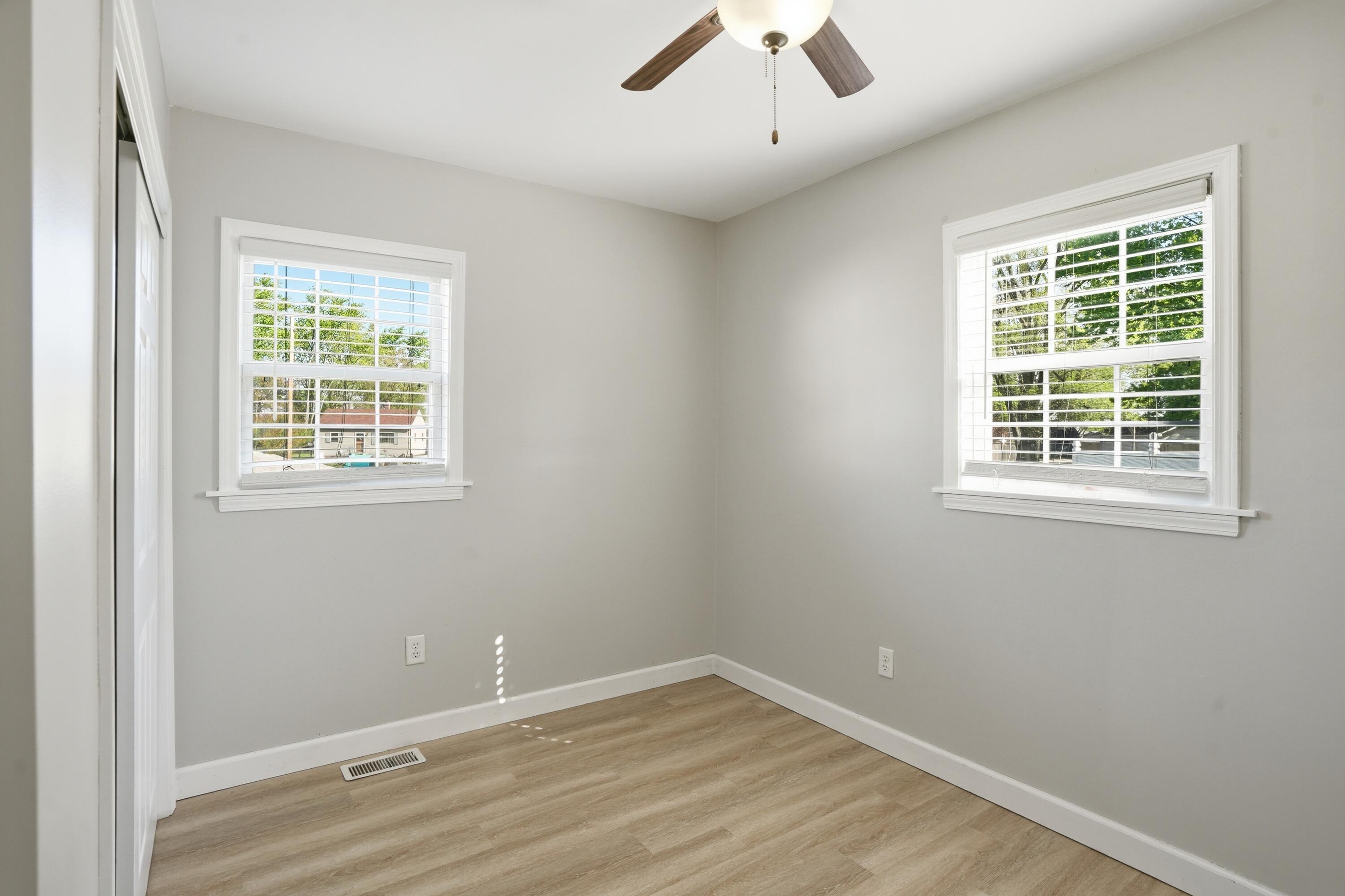 316 Oak Circle Crown Point, IN 46307 - Photo 9 of 19 an empty room with a window