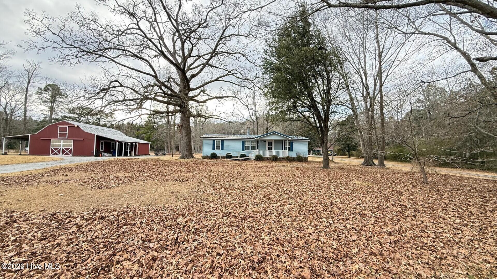 1068 Harrell's Loop Road Jacksonville, NC 28540 - Photo 24 of 28 front home barn