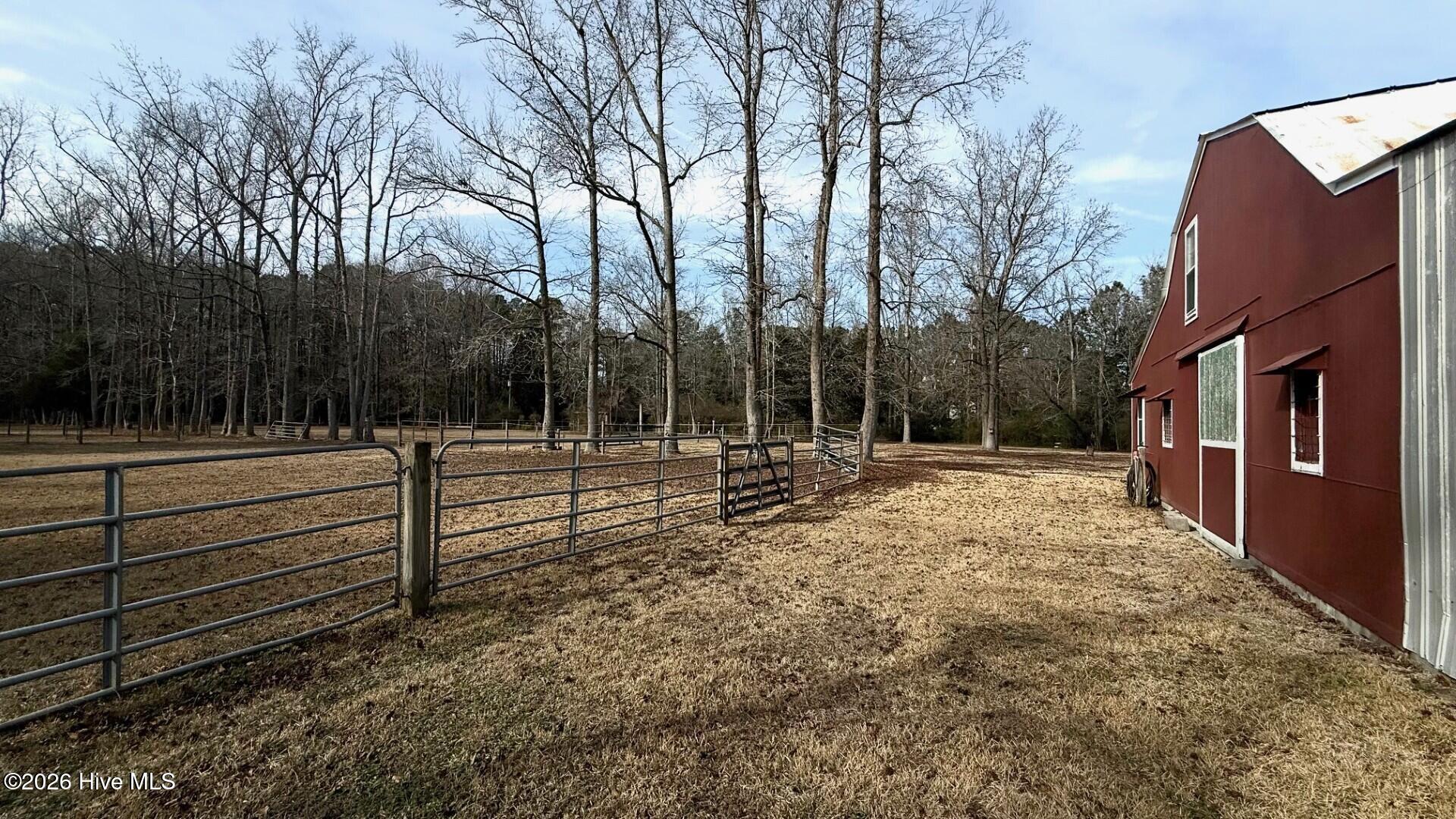 1068 Harrell's Loop Road Jacksonville, NC 28540 - Photo 4 of 28 barn field