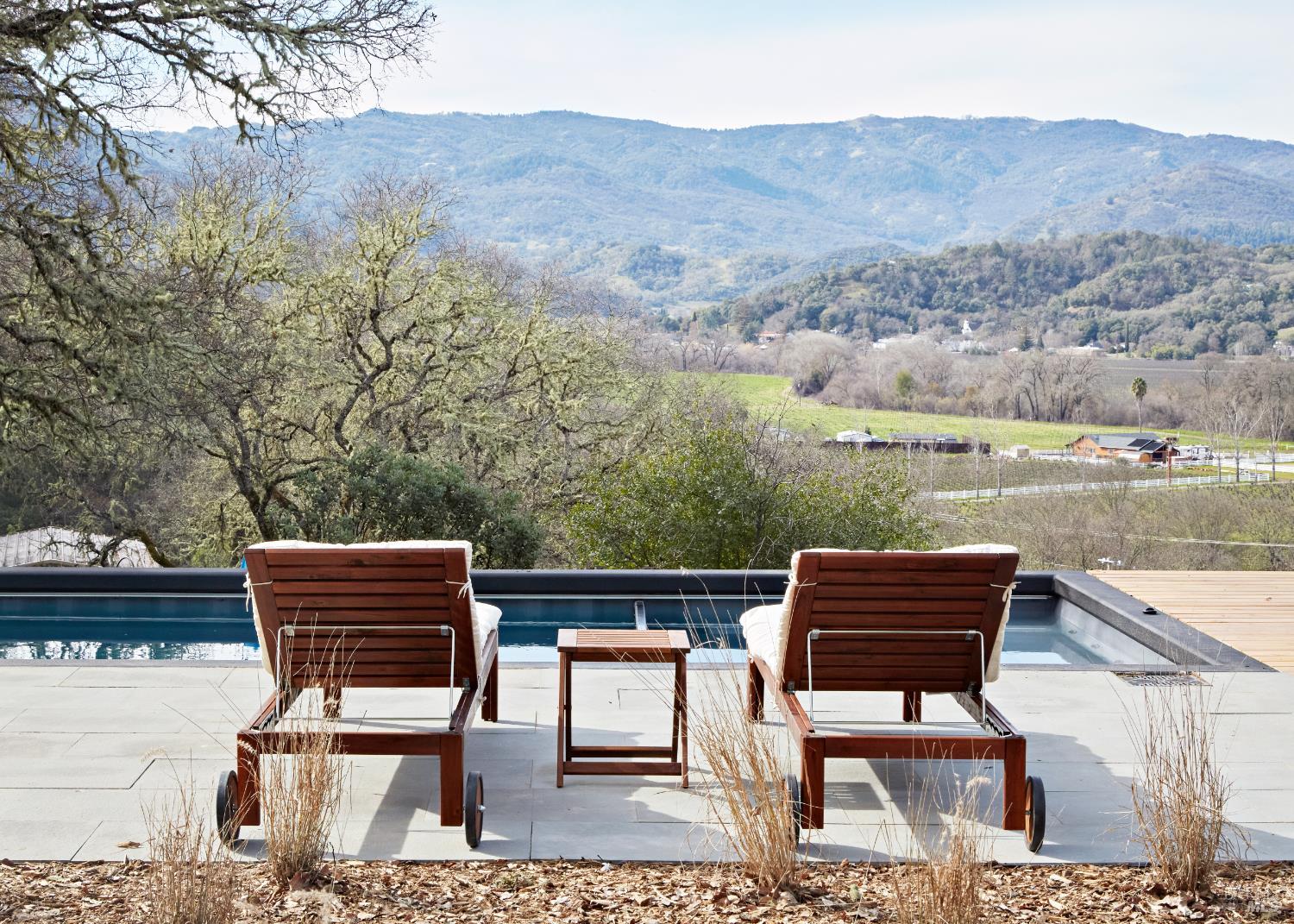 a view of a chairs and table on the terrace