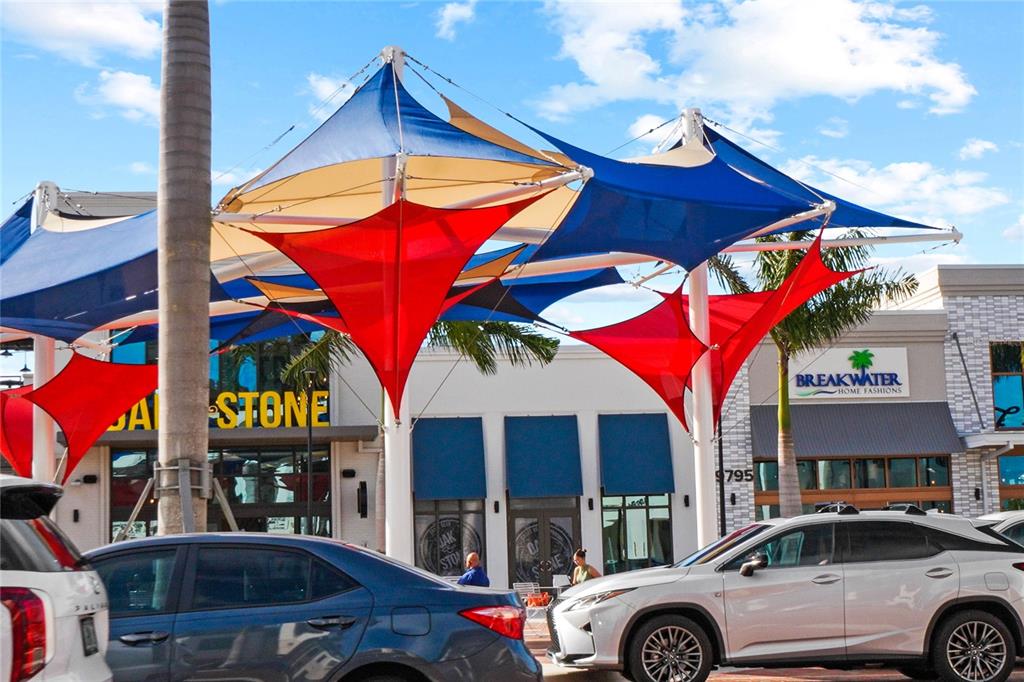 17577 Santorini Court Venice, FL 34293 - Photo 53 of 54 a car parked in front of a building