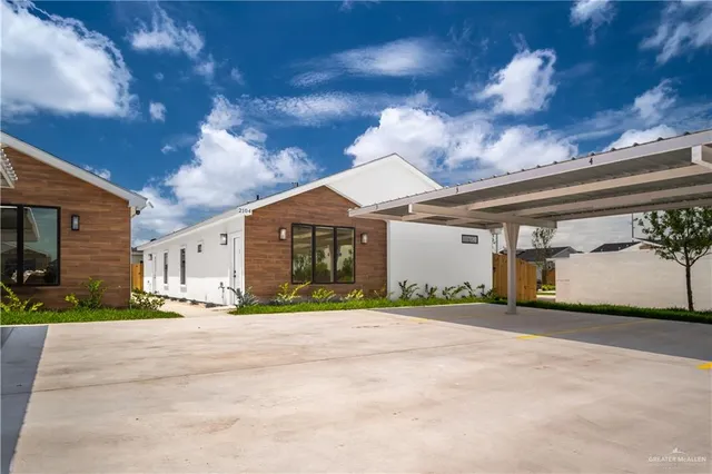 a view of a building with a street