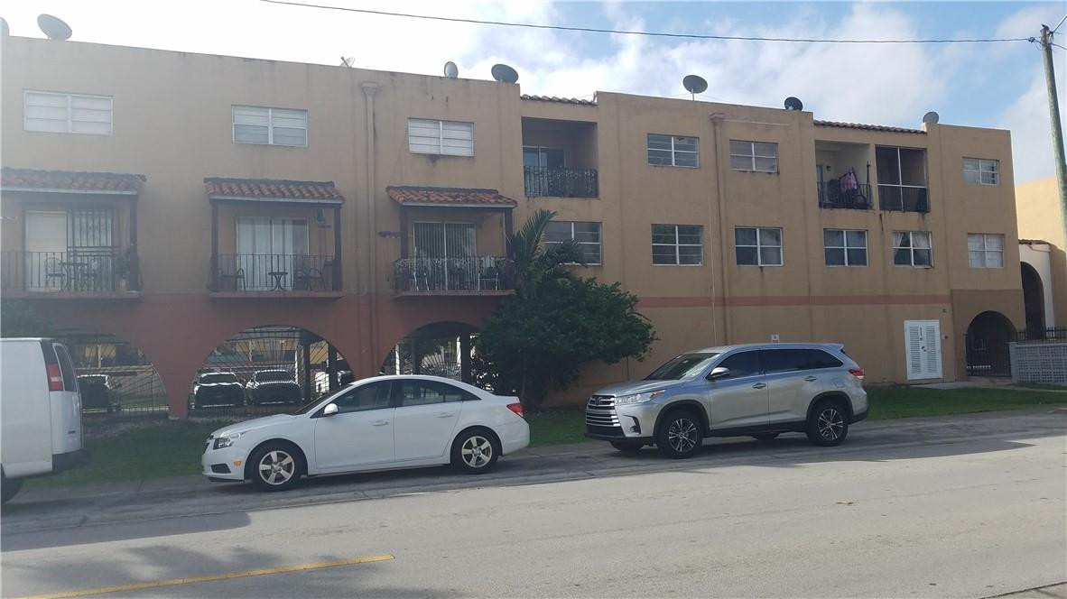 a car parked in front of a building