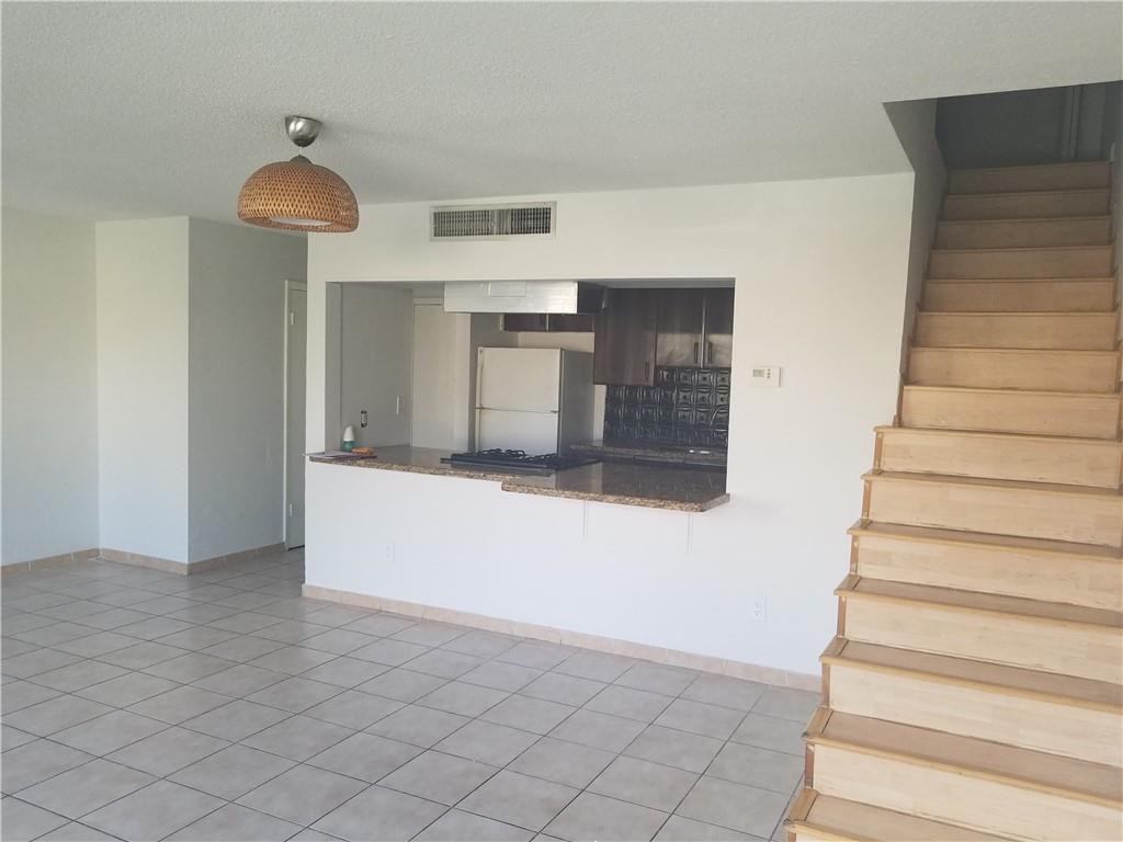 1300 West 53rd Street, Unit 7 Hialeah, FL 33012 - Photo 11 of 22 a view of entryway and hall